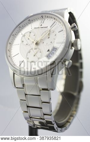Geneve, Switzerland 01.10.2020 - Claude Bernard Man Swiss Made Watch White Dial Metal Bracelet Isola