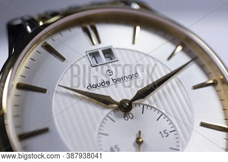 Geneve, Switzerland 01.10.2020 - Claude Bernard Man Swiss Made Watch Gold Pvd Coating White Dial Clo