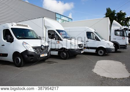 Bordeaux , Aquitaine / France - 09 25 2020 : Transport Dumont Several White Cars Vans Trucks Parked 
