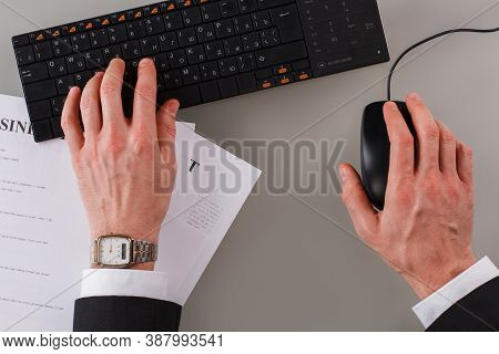 Businessman Hands Working At Desk In Office. Close Up Of Businessman Hands Typing On Keyboard At His