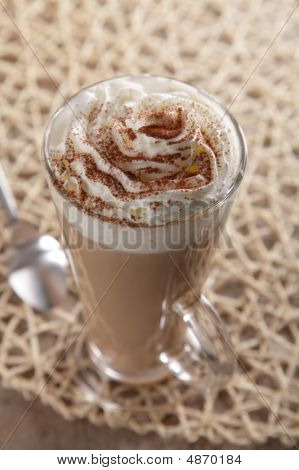 Coffee Latte Whipped Cream And Cacao Dust In Rustic Style