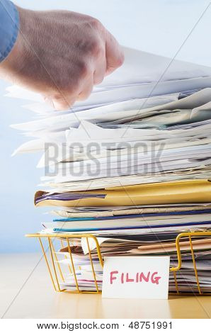 Ufficio deposito vassoio con mano