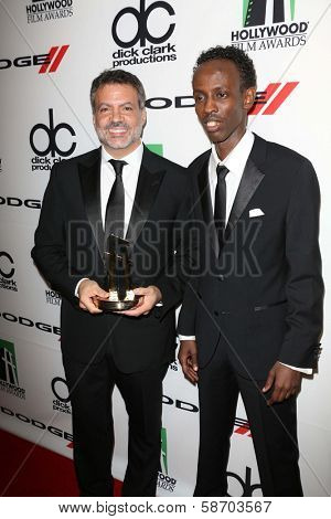 Michael Deluca and Barkhad Abdi at the 17th Annual Hollywood Film Awards Backstage, Beverly Hilton Hotel, Beverly Hills, CA 10-21-13