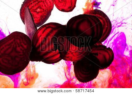 Close up of sliced raw beet in water