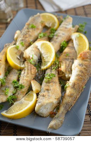 Roasted ice fish with lemon and parsley