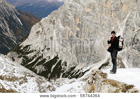 Alpinist climbing ferrata La torre di Toblin (2.617 m), Dolomites, Italy, Europe