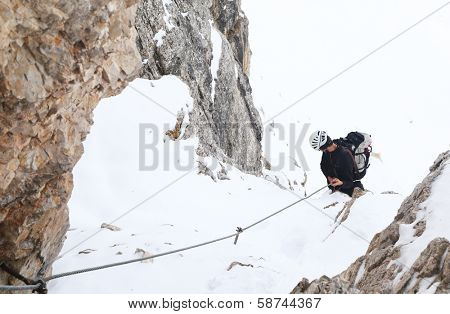 Alpinist climbing ferrata La torre di Toblin (2.617 m), Dolomites, Italy, Europe