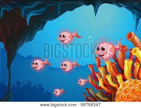 Illustration of a school of puffer fishes inside the sea cave