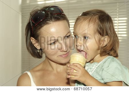 Little girl eating ice cream