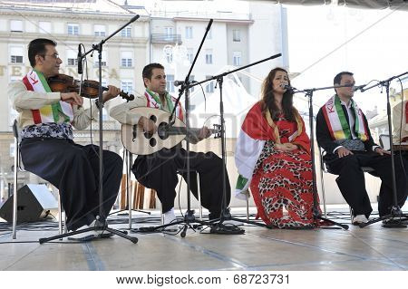 ZAGREB, CROATIA - JULY 18: Members of folk group Payiz from Sulaimaniya, Kurdistan, Iraq during the 48th International Folklore Festival in center of Zagreb, Croatia on July 18, 2014