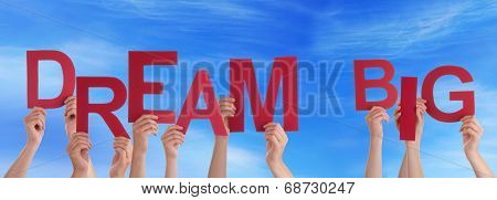 Hands Holding Dream Big in the Sky