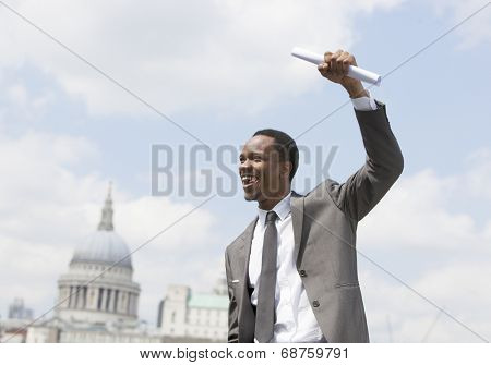 Portrait of Afircan American businessman celebrating