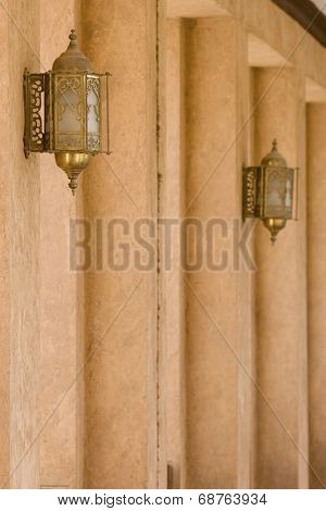 Al Ain, UAE, Architectural detail of hallway and ornate lanterns at Al Ain Palace Museum