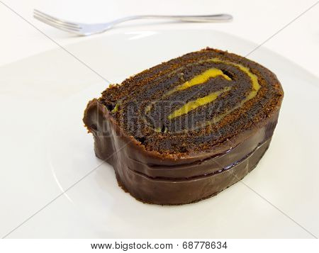 Chocolate And Custard Swiss Roll.