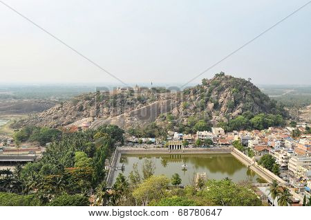 Traditional Hindu temple with tank in India