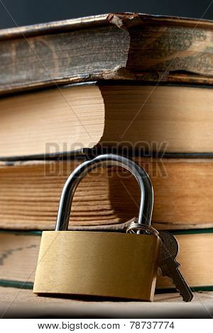Pile Of Old Books And Keylock