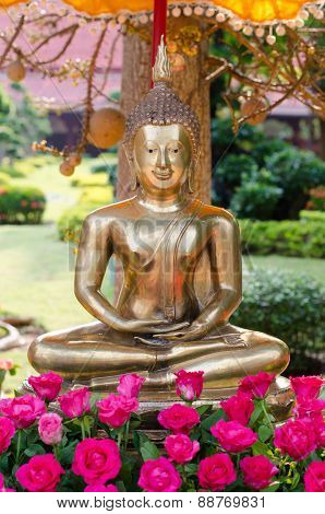 Buddha Image And Flowers In The Songkran Festival, Thailand
