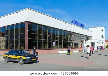 POLOTSK BELARUS - MAY 19 2017: Unknown people go to bus station building Polotsk Belarus