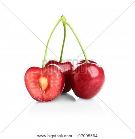 Fresh ripe cherries on white background