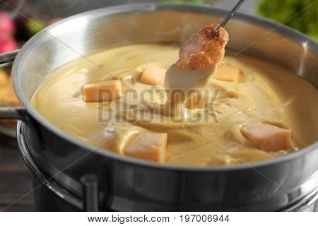 Rusk and cheese fondue, closeup