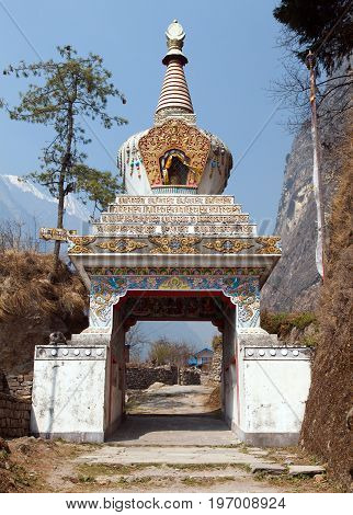 buddhist stupa in Chame village round annapurna circuit trekking trail Nepal