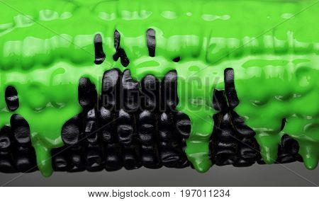 Black Corn With Pouring Green Paint Background, Macro Closeup.texture