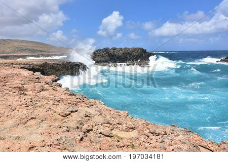 Waves splashing and crashing ashore in Aruba.
