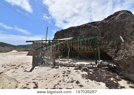 Aruba's Andicuri beach with a shade structure in Aruba.