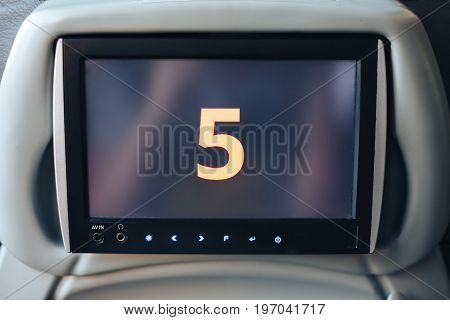 Long-distance international bus of the raised comfort with built in seat chair, a TV or a tablet where they can watch movies during road and listen to music, surf the Internet