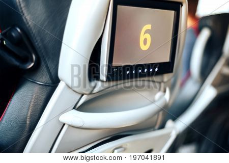 Long-distance international bus of the raised comfort with built in seat chair, a TV or a tablet where they can watch movies during road and listen to music, surf the Internet