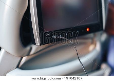Long-distance international bus of the raised comfort with built in seat chair, a TV or a tablet where they can watch movies during road and listen to music, surf the Internet