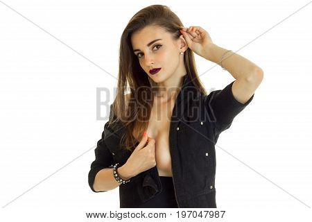 portrait of beautiful brunette lady in black jacket without bra looking at the camera isolated on white background