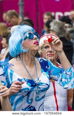 BERLIN GERMANY - JUNE 27 2015: Christopher Street Day (CSD). The annual European LGBT celebration and demonstration held in Berlin for the rights of LGBT people and against discrimination and exclusion.