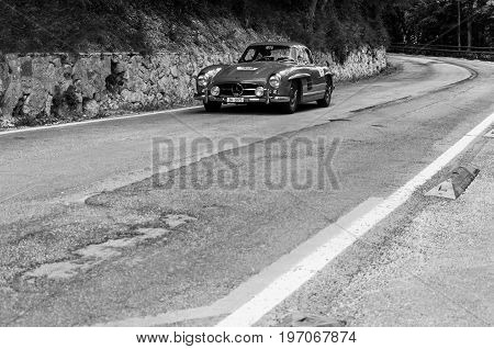 GOLA DEL FURLO, ITALY - MAY 19:MERCEDES-BENZ 300 SL COUPÉ W 198 LEICHTBAU 1955 on an old racing car in rally Mille Miglia 2017 the famous italian historical race (1927-1957) on May 19 2017