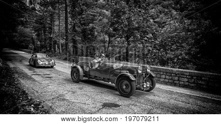GOLA DEL FURLO, ITALY - MAY 19: LAGONDA M45 RAPIDE 1935 on an old racing car in rally Mille Miglia 2017 the famous italian historical race (1927-1957) on May 19 2017