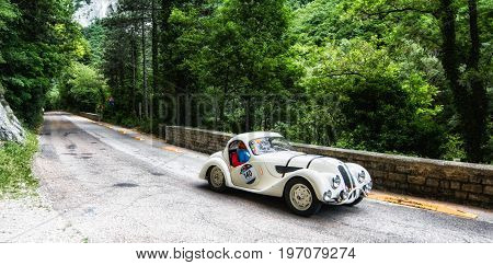 GOLA DEL FURLO, ITALY - MAY 19: BMW 328 COUPÉ 1937 on an old racing car in rally Mille Miglia 2017 the famous italian historical race (1927-1957) on May 19 2017
