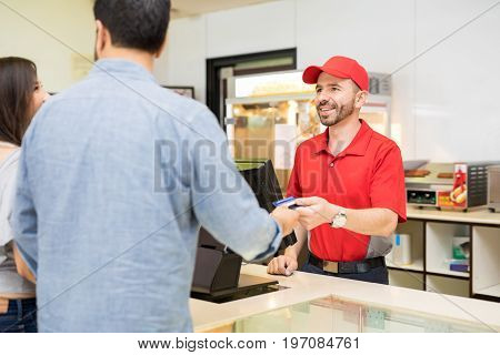 Worker Selling Some Food At The Movies