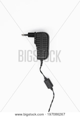 ac to dc adapter in white background