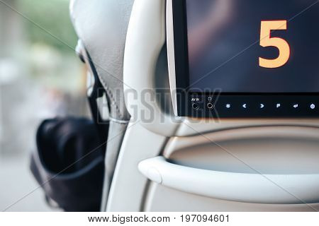 Long-distance international bus of the raised comfort with built in seat chair, a TV or a tablet where they can watch movies during road and listen to music, surf the Internet
