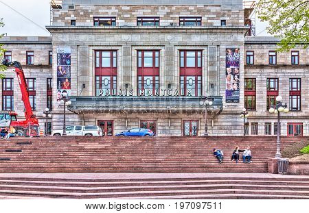 Quebec City, Canada - May 29, 2017: Palais Montcalm Colorful Theater With People Sitting On Red Stai