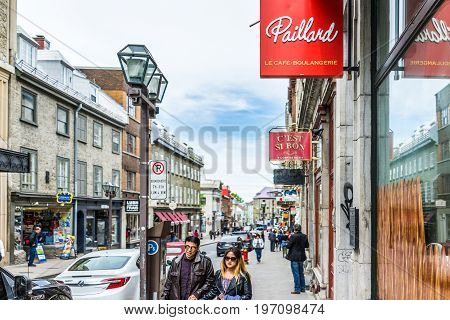 Quebec City, Canada - May 29, 2017: Old Town Street With People Walking By Restaurants And Paillard