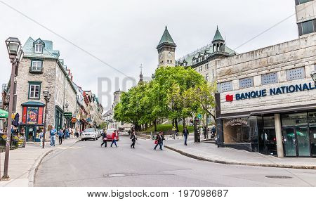 Quebec City, Canada - May 29, 2017: Old Town Street Panorama With Sign For Banque Nationale, Restaur