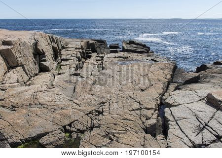 Jagged Rocks On Shoreline In Acadia National Park