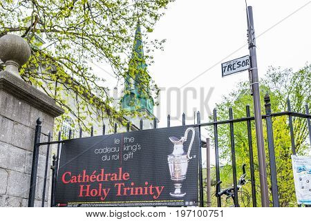Quebec City, Canada - May 29, 2017: Old Town Street With Cathedral Holy Trinity Sign Advertisement A