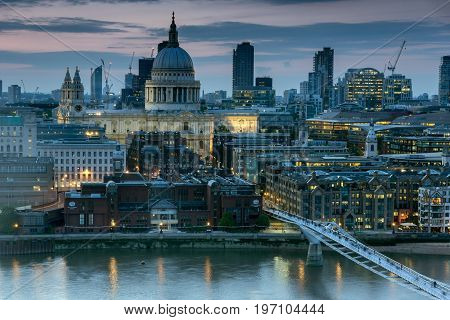 LONDON, ENGLAND - JUNE 18, 2016: Sunset panorama from Tate modern Gallery to city of London, England, Great Britain