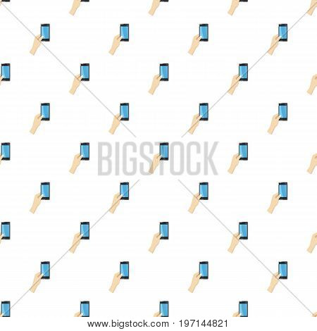 Hand holding smartphone pattern seamless repeat in cartoon style vector illustration