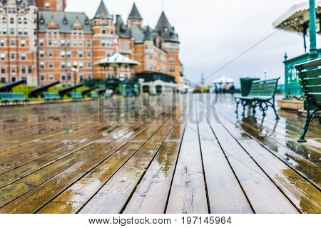 Quebec City, Canada - May 30, 2017: Old Town Street And View Of Hotel Chateau Frontenac With Cannons