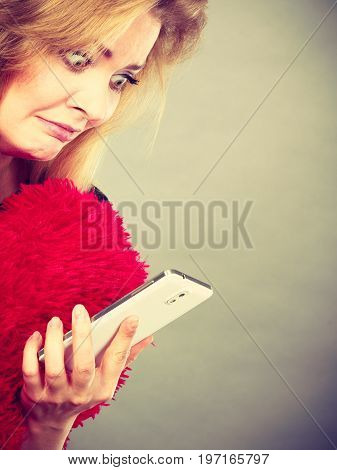 Shocked Heartbroken Woman Looking At Her Phone