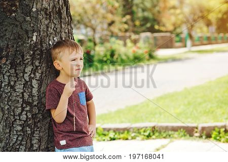 Cute Little Boy Looking Up The Sky In Sunny Day. Child Dreaming, Hope Concepts.
