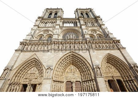 Bottom view of French Gothic architecture of Notre Dame cathedral of Paris, France. isolated on white background and copy space. Our Lady of Paris church. Central main facade.